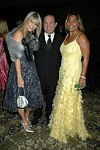 Michael and Marcy Warren, L. Marilyn Crawford at a party to celebrate the August nuptials of comic Daniella Rich and real-estate maven Richard Kilstock  at Pier 60 in Manhattan on October 7, 2004. photo by Rob Rich copyright 2004. 516-676-3939 robwayne1@aol.com