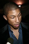 Pharrell Williams at the 2004 Costume Institute Gala &quotDangerous Liaisons&quot <br>at the Metropolitan Museum of Art on April 26, 2004 in N.Y.C. photo by Rob Rich copyright 2004 516-676-3939<br>robwayne1@aol.com