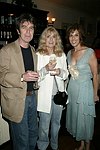 Michael Mislove, producer Bellie Bellflower, and Peggy Siegel at the after party for &quotFinding Neverland&quot at Savannah in Southampton on 8-29-04. photo by Rob Rich copyright 2004<br>516-676-3939<br>robwayne1@aol.com