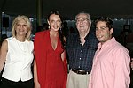 Linda Lippa, Anna Anissimova, Dr.Bob Cancro, and Mike Heller at the  benefit for the NYU School of Medicine - Mental Illness Prevention Center hosted by Anna Anissimova at the Southampton residence of Denise Rich on August 14, 2004 at the Rich residence in Southampton, N.Y.<br>photo by Rob Rich copyright 2004 516-676-3939 robwayne1@aol.com