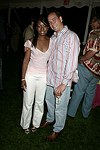Millie Monyo and Scott Storbo at the  benefit for the NYU School of Medicine - Mental Illness Prevention Center hosted by Anna Anissimova at the Southampton residence of Denise Rich on August 14, 2004 at the Rich residence in Southampton, N.Y.<br>photo by Rob Rich copyright 2004 516-676-3939 robwayne1@aol.com