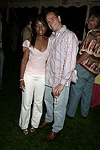 Millie Monyo and Scott Storbo at the  benefit for the NYU School of Medicine - Mental Illness Prevention Center hosted by Anna Anissimova at the Southampton residence of Denise Rich on August 14, 2004 at the Rich residence in Southampton, N.Y.<br>photo by Rob Rich copyright 2004 516-676-3939 robwayne1@aol.com