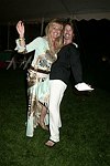 Dancing at the  benefit for the NYU School of Medicine - Mental Illness Prevention Center hosted by Anna Anissimova at the Southampton residence of Denise Rich on August 14, 2004 at the Rich residence in Southampton, N.Y.<br>photo by Rob Rich copyright 2004 516-676-3939 robwayne1@aol.com