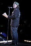 NEW YORK - MAY 8: Rock star Bono give a speech at the American Express &quotLive At The Battery&quot Concert during the 2004 Tribeca Film Festival May 8, 2004 in New York City. <br>  (Photo by Rob Rich/Getty Images) 