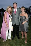LIz Walsh, Barry Buckland, and Connie Vick at the 8th. Annual Orchid Ball  to benefit the Child Developement Center of the Hamptons on July 24, 2004 at the Villa Maria in Watermill. photo by Rob Rich copyright 2004 516-676-3939  robwayne1@aol.com