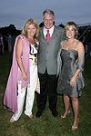  Liz Walsh, Barry Buckland, and Connie Vick at the 8th. Annual Orchid Ball  to benefit the Child Developement Center of the Hamptons on July 24, 2004 at the Villa Maria in Watermill. photo by Rob Rich copyright 2004 516-676-3939  robwayne1@aol.com