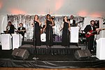 The Starlight Orchestra  at the 8th. Annual Orchid Ball  to benefit the Child Developement Center of the Hamptons on July 24, 2004 at the Villa Maria in Watermill. photo by Rob Rich copyright 2004 516-676-3939  robwayne1@aol.com