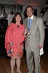 Joann Ross and Stewart F. Lane  at the 8th. Annual Orchid Ball  to benefit the Child Developement Center of the Hamptons on July 24, 2004 at the Villa Maria in Watermill. photo by Rob Rich copyright 2004 516-676-3939  robwayne1@aol.com