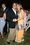 Larry and Sandy Rosenthal  at the 8th. Annual Orchid Ball  to benefit the Child Developement Center of the Hamptons on July 24, 2004 at the Villa Maria in Watermill. photo by Rob Rich copyright 2004 516-676-3939  robwayne1@aol.com