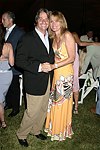 Larry and Sandy Rosenthal  at the 8th. Annual Orchid Ball  to benefit the Child Developement Center of the Hamptons on July 24, 2004 at the Villa Maria in Watermill. photo by Rob Rich copyright 2004 516-676-3939  robwayne1@aol.com