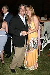 Larry and Sandy Rosenthal  at the 8th. Annual Orchid Ball  to benefit the Child Developement Center of the Hamptons on July 24, 2004 at the Villa Maria in Watermill. photo by Rob Rich copyright 2004 516-676-3939  robwayne1@aol.com