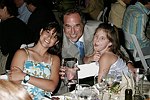 Holly, Stewart, and Leah Lane  at the 8th. Annual Orchid Ball  to benefit the Child Developement Center of the Hamptons on July 24, 2004 at the Villa Maria in Watermill. photo by Rob Rich copyright 2004 516-676-3939  robwayne1@aol.com