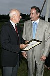 Senator Lavalle and Stewart Lane  at the 8th. Annual Orchid Ball  to benefit the Child Developement Center of the Hamptons on July 24, 2004 at the Villa Maria in Watermill. photo by Rob Rich copyright 2004 516-676-3939  robwayne1@aol.com