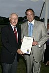 Senator Lavalle and Stewart Lane  at the 8th. Annual Orchid Ball  to benefit the Child Developement Center of the Hamptons on July 24, 2004 at the Villa Maria in Watermill. photo by Rob Rich copyright 2004 516-676-3939  robwayne1@aol.com