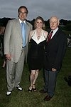 Stewart Lane, Bonnie Comley, and Senator Lavalle  at the 8th. Annual Orchid Ball  to benefit the Child Developement Center of the Hamptons on July 24, 2004 at the Villa Maria in Watermill. photo by Rob Rich copyright 2004 516-676-3939  robwayne1@aol.com