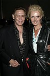 Dr.Lewis Feder and Brigitte Mansfield  at the 8th. Annual Orchid Ball  to benefit the Child Developement Center of the Hamptons on July 24, 2004 at the Villa Maria in Watermill. photo by Rob Rich copyright 2004 516-676-3939  robwayne1@aol.com