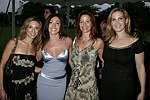 Caroline Fuchs, Lisa Aquilino, Elise Leve, and Marcy Epstein  at the 8th. Annual Orchid Ball  to benefit the Child Developement Center of the Hamptons on July 24, 2004 at the Villa Maria in Watermill. photo by Rob Rich copyright 2004 516-676-3939  robwayne1@aol.com