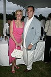 Tricia and Beppe Desiderio  at the 8th. Annual Orchid Ball  to benefit the Child Developement Center of the Hamptons on July 24, 2004 at the Villa Maria in Watermill. photo by Rob Rich copyright 2004 516-676-3939  robwayne1@aol.com