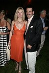 Colleen and Gary Rein  at the 8th. Annual Orchid Ball  to benefit the Child Developement Center of the Hamptons on July 24, 2004 at the Villa Maria in Watermill. photo by Rob Rich copyright 2004 516-676-3939  robwayne1@aol.com