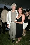  Christoper and Eve Jarrett at the 8th. Annual Orchid Ball  to benefit the Child Developement Center of the Hamptons on July 24, 2004 at the Villa Maria in Watermill. photo by Rob Rich copyright 2004 516-676-3939  robwayne1@aol.com