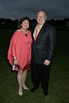 Joann Ross and Michael Zelamn   at the 8th. Annual Orchid Ball  to benefit the Child Developement Center of the Hamptons on July 24, 2004 at the Villa Maria in Watermill. photo by Rob Rich copyright 2004 516-676-3939  robwayne1@aol.com