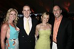 Trish Backal, John and Laura Barker, and John Hummel  at the 8th. Annual Orchid Ball  to benefit the Child Developement Center of the Hamptons on July 24, 2004 at the Villa Maria in Watermill. photo by Rob Rich copyright 2004 516-676-3939  robwayne1@aol.com