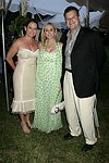 Dawn Zimmerman Hummel, Iris and Michael Smith  at the 8th. Annual Orchid Ball  to benefit the Child Developement Center of the Hamptons on July 24, 2004 at the Villa Maria in Watermill. photo by Rob Rich copyright 2004 516-676-3939  robwayne1@aol.com