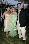  Trish Backal, John and Laura Barker, and John Hummel   at the 8th. Annual Orchid Ball  to benefit the Child Developement Center of the Hamptons on July 24, 2004 at the Villa Maria in Watermill. photo by Rob Rich copyright 2004 516-676-3939  robwayne1@aol.com