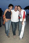 Monique Darton, Noah Teppenberg, and Giulliana Weston at the annual Hamptons Clambake at Flying Point Beach in Watermill on 7-11-04<br>photo by Rob Rich copyright 2004 516-676-3939 robwayne1@aol.com