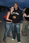 Tiffany Taylor and Rich Thomas at the annual Hamptons Clambake at Flying Point Beach in Watermill on 7-11-04<br>photo by Rob Rich copyright 2004 516-676-3939 robwayne1@aol.com