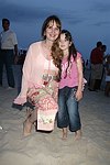 Sara and Alana Galloway at the annual Hamptons Clambake at Flying Point Beach in Watermill on 7-11-04<br>photo by Rob Rich copyright 2004 516-676-3939 robwayne1@aol.com
