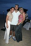 Tressa Weg Recanati ,Gregg Bello, and Arlene Kuljis at the annual Hamptons Clambake at Flying Point Beach in Watermill on 7-11-04<br>photo by Rob Rich copyright 2004 516-676-3939 robwayne1@aol.com