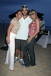 Tressa Weg Recanati ,Gregg Bello, and Arlene Kuljis at the annual Hamptons Clambake at Flying Point Beach in Watermill on 7-11-04<br>photo by Rob Rich copyright 2004 516-676-3939 robwayne1@aol.com