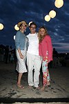 Daysi Olarte deKaneros, Jason Oliver Nixon, and Carolyne Berthet at the annual Hamptons Clambake at Flying Point Beach in Watermill on 7-11-04<br>photo by Rob Rich copyright 2004 516-676-3939 robwayne1@aol.com