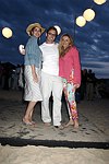 Daysi Olarte deKaneros, Jason Oliver Nixon, and Carolyne Berthet at the annual Hamptons Clambake at Flying Point Beach in Watermill on 7-11-04<br>photo by Rob Rich copyright 2004 516-676-3939 robwayne1@aol.com