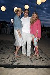 Daysi Olarte deKaneros, Jason Oliver Nixon, and Carolyne Berthet at the annual Hamptons Clambake at Flying Point Beach in Watermill on 7-11-04<br>photo by Rob Rich copyright 2004 516-676-3939 robwayne1@aol.com