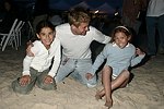 Tim Schifter with kids at the annual Hamptons Clambake at Flying Point Beach in Watermill on 7-11-04<br>photo by Rob Rich copyright 2004 516-676-3939 robwayne1@aol.com