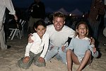 Tim Schifter with kids at the annual Hamptons Clambake at Flying Point Beach in Watermill on 7-11-04<br>photo by Rob Rich copyright 2004 516-676-3939 robwayne1@aol.com