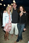 Mia and Jason Bauer and Tamar Press at the annual Hamptons Clambake at Flying Point Beach in Watermill on 7-11-04<br>photo by Rob Rich copyright 2004 516-676-3939 robwayne1@aol.com