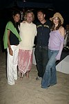 Margo Zucco, John Flanagan, Jason Strauss, and Katie Holloday at the annual Hamptons Clambake at Flying Point Beach in Watermill on 7-11-04<br>photo by Rob Rich copyright 2004 516-676-3939 robwayne1@aol.com