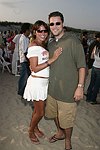 Lu and Kyle Berry at the annual Hamptons Clambake at Flying Point Beach in Watermill on 7-11-04<br>photo by Rob Rich copyright 2004 516-676-3939 robwayne1@aol.com