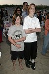 Austin Lingerfelt &  Kevin Klein at the annual Hamptons Clambake at Flying Point Beach in Watermill on 7-11-04<br>photo by Rob Rich copyright 2004 516-676-3939 robwayne1@aol.com