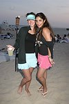Lissa Van Delo, Alex Nourafchan at the annual Hamptons Clambake at Flying Point Beach in Watermill on 7-11-04<br>photo by Rob Rich copyright 2004 516-676-3939 robwayne1@aol.com