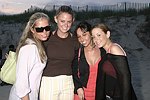 Alissa Dolganovskaya, Kimberly Birnbaum, Sherry Alexander, and Jamie Rubin at the annual Hamptons Clambake at Flying Point Beach in Watermill on 7-11-04<br>photo by Rob Rich copyright 2004 516-676-3939 robwayne1@aol.com