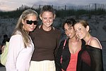 Alissa Dolganovskaya, Kimberly Birnbaum, Sherry Alexander, and Jamie Rubin at the annual Hamptons Clambake at Flying Point Beach in Watermill on 7-11-04<br>photo by Rob Rich copyright 2004 516-676-3939 robwayne1@aol.com