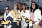 Mara Gibbs, Ann Lawlor, Susan Consentino, and Nora Lawlor at the annual Hamptons Clambake at Flying Point Beach in Watermill on 7-11-04<br>photo by Rob Rich copyright 2004 516-676-3939 robwayne1@aol.com