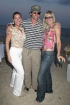 Tressa Weg Recanati , Donega; Fitzgerald, and Arlene Kuljis at the annual Hamptons Clambake at Flying Point Beach in Watermill on 7-11-04<br>photo by Rob Rich copyright 2004 516-676-3939 robwayne1@aol.com