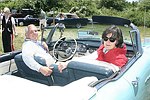 Kevin and Margaret Bodkin in their 1058 Caddy convertible on 6-13-04 at the Concourse D'elegance at Sayre Park in Bridgehampton, N.Y.<br>photo by Rob Rich copyright 2004<br>516-676-3939 robwayne1@aol.com