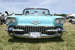  Margaret and Kevin  Bodkin in their 1058 Caddy convertible on 6-13-04 at the Concourse D'elegance at Sayre Park in Bridgehampton, N.Y.<br>photo by Rob Rich copyright 2004<br>516-676-3939 robwayne1@aol.com 