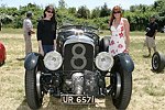 Raven and Alexis Rodriguez with the 1929 Ralph Lauren Bentley valued at over $4 million dollars  on 6-13-04 at the Concourse D'elegance at Sayre Park in Bridgehampton, N.Y.<br>photo by Rob Rich copyright 2004<br>516-676-3939 robwayne1@aol.com